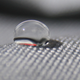 Wwater beading from a DWR-coated surface (Image by Brocken Inaglory